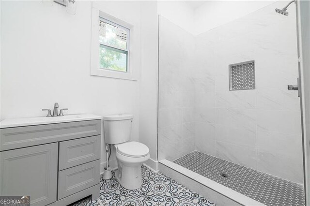 140 Racine St, Atlanta, GA 30314 - full bath with a shower stall, vanity, and tile patterned floors