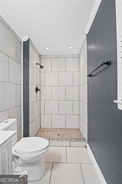 6997 Vesta Brook Dr, Morrow, GA 30260 - bathroom with toilet, tiled shower, crown molding, recessed lighting, and marble finish flooring