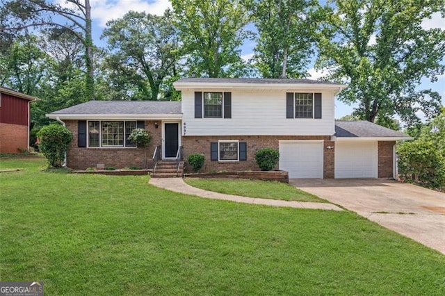 6997 Vesta Brook Dr, Morrow, GA 30260 - split level home with brick siding, concrete driveway, a front lawn, and entry steps