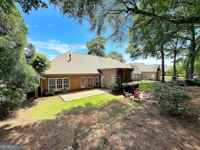 211 English Oaks Ln, Mcdonough, GA 30253 - back of property featuring a patio area and brick siding