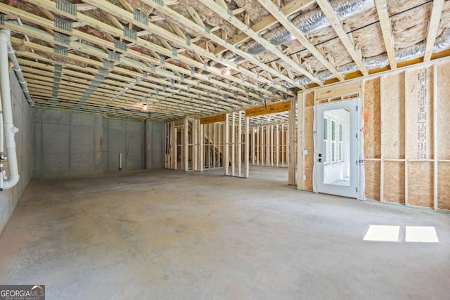 miscellaneous room featuring unfinished concrete floors