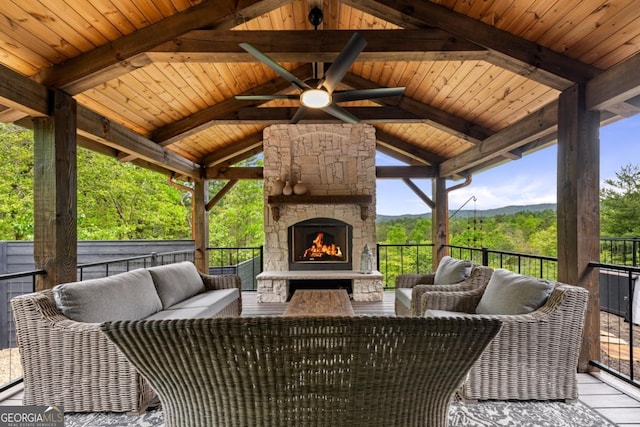 312 Charles Rd, Ellijay, GA 30540 - view of patio / terrace with a gazebo, an outdoor living space with a fireplace, a ceiling fan, and a mountain view