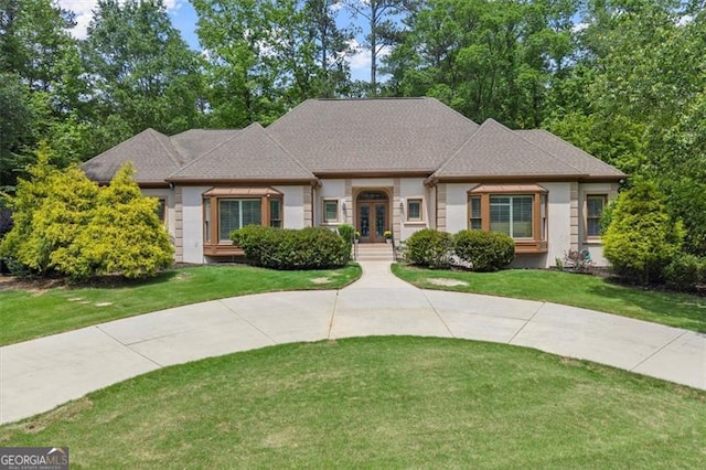 194 Sentinel Pl SE, Marietta, GA 30067 - view of front facade featuring french doors, a front lawn, and stucco siding