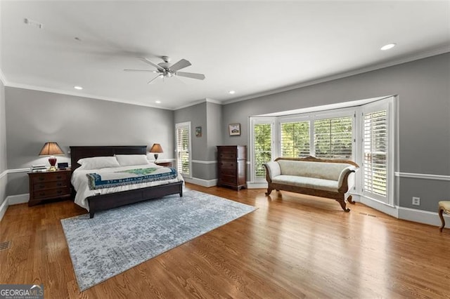 194 Sentinel Pl SE, Marietta, GA 30067 - bedroom with baseboards, ornamental molding, wood finished floors, recessed lighting, and ceiling fan