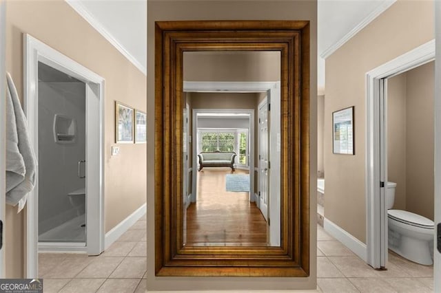 194 Sentinel Pl SE, Marietta, GA 30067 - hall featuring ornamental molding, light tile patterned flooring, and baseboards