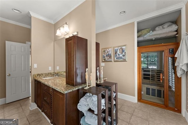 194 Sentinel Pl SE, Marietta, GA 30067 - bathroom with tile patterned floors, crown molding, baseboards, and vanity