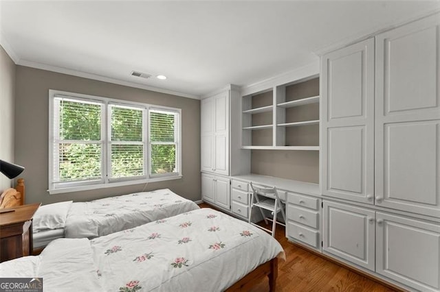 194 Sentinel Pl SE, Marietta, GA 30067 - bedroom with ornamental molding, wood finished floors, and recessed lighting