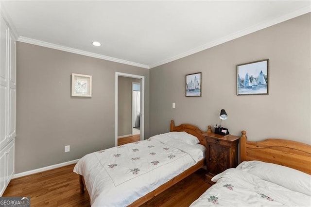 194 Sentinel Pl SE, Marietta, GA 30067 - bedroom featuring crown molding, wood finished floors, baseboards, and recessed lighting