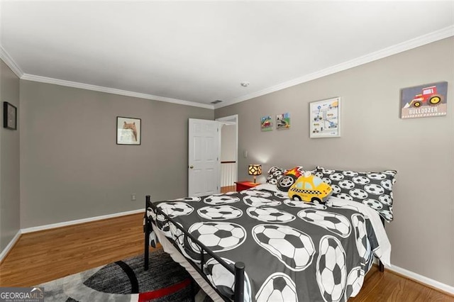 194 Sentinel Pl SE, Marietta, GA 30067 - bedroom with wood finished floors, ornamental molding, and baseboards