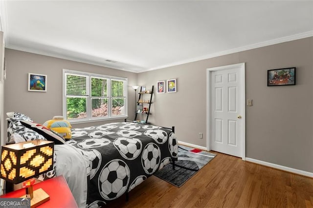 194 Sentinel Pl SE, Marietta, GA 30067 - bedroom with crown molding, wood finished floors, and baseboards