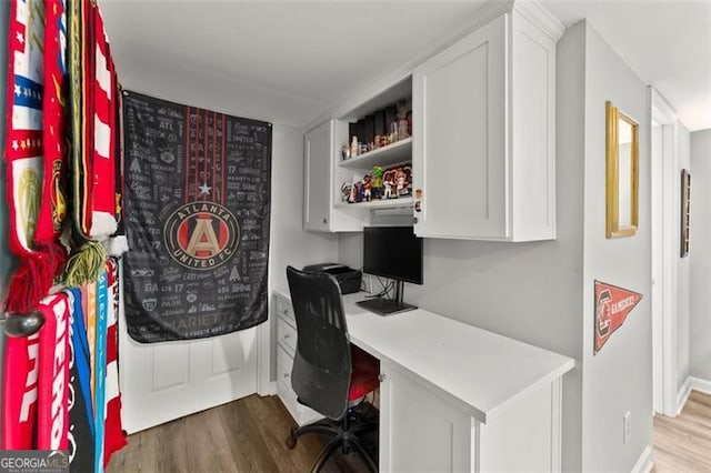194 Sentinel Pl SE, Marietta, GA 30067 - office featuring built in study area, wood finished floors, and baseboards