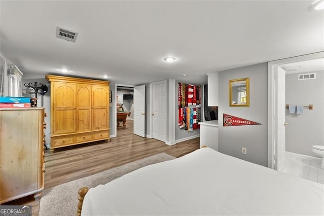 194 Sentinel Pl SE, Marietta, GA 30067 - bedroom with baseboards, recessed lighting, and wood finished floors