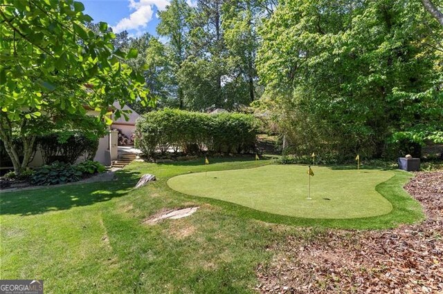 194 Sentinel Pl SE, Marietta, GA 30067 - view of grassy yard with a putting area