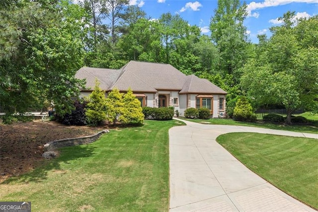 194 Sentinel Pl SE, Marietta, GA 30067 - view of front of house with driveway and a front yard