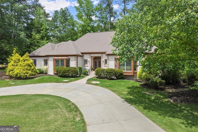 194 Sentinel Pl SE, Marietta, GA 30067 - view of front of house featuring french doors, a front lawn, and stucco siding