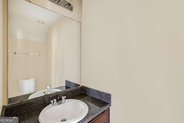 40 Wimberly Way, Covington, GA 30016 - bathroom with vanity and toilet