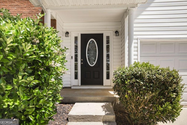 40 Wimberly Way, Covington, GA 30016 - property entrance featuring an attached garage