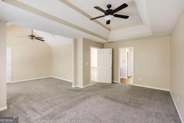 40 Wimberly Way, Covington, GA 30016 - unfurnished room featuring a ceiling fan, carpet flooring, baseboards, and a raised ceiling