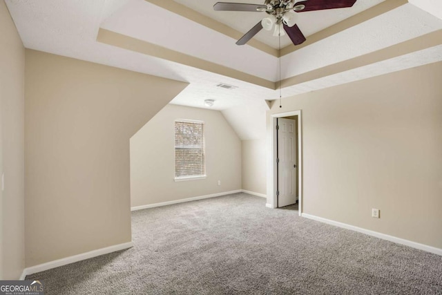 40 Wimberly Way, Covington, GA 30016 - additional living space with carpet flooring, ceiling fan, baseboards, and lofted ceiling