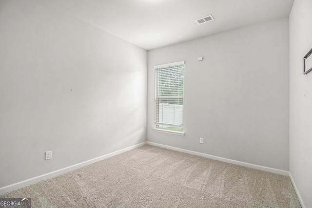 206 Brookview Dr, Newnan, GA 30265 - unfurnished room featuring baseboards and light colored carpet
