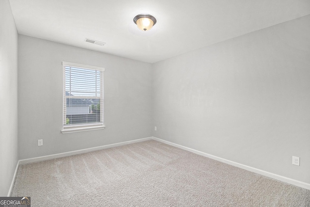 206 Brookview Dr, Newnan, GA 30265 - carpeted empty room with baseboards