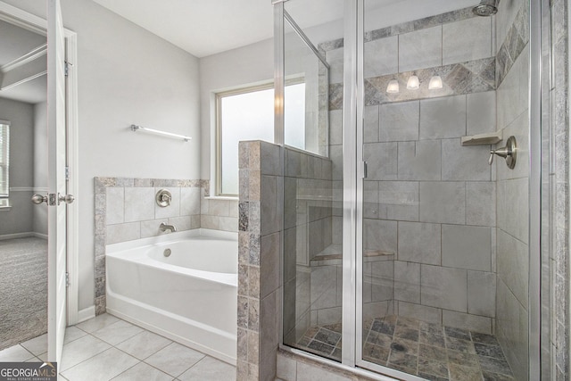 206 Brookview Dr, Newnan, GA 30265 - full bathroom featuring a bath, a stall shower, and tile patterned floors