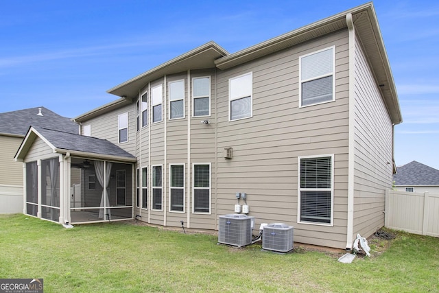206 Brookview Dr, Newnan, GA 30265 - back of property featuring cooling unit and a sunroom