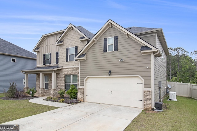 206 Brookview Dr, Newnan, GA 30265 - craftsman house featuring an attached garage, concrete driveway, brick siding, board and batten siding, and central air condition unit