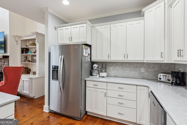 61 Deer Run Rdg, Big Canoe, GA 30143 - kitchen with stainless steel fridge with ice dispenser, crown molding, tasteful backsplash, white cabinets, and wood finished floors