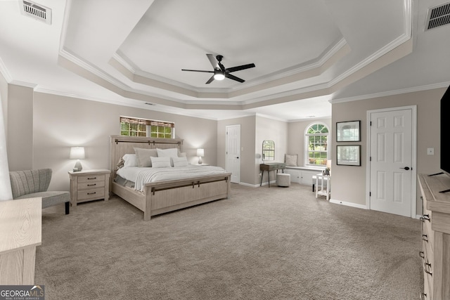 6520 Glen Pond Trce, Cumming, GA 30028 - carpeted bedroom featuring a tray ceiling, crown molding, baseboards, and ceiling fan