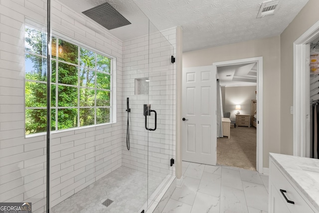6520 Glen Pond Trce, Cumming, GA 30028 - ensuite bathroom featuring a shower stall, marble finish floors, baseboards, and vanity