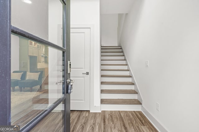 2318 Polar Rock Ter, Atlanta, GA 30315 - staircase featuring wood finished floors and baseboards