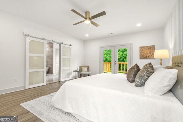 2318 Polar Rock Ter, Atlanta, GA 30315 - bedroom featuring access to exterior, french doors, wood finished floors, a barn door, and recessed lighting