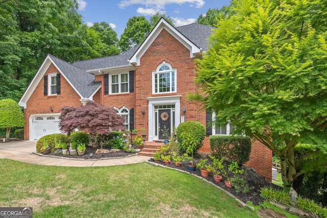 420 Windswept Ct, Roswell, GA 30075 - view of front facade featuring a garage, brick siding, a shingled roof, concrete driveway, and a front yard