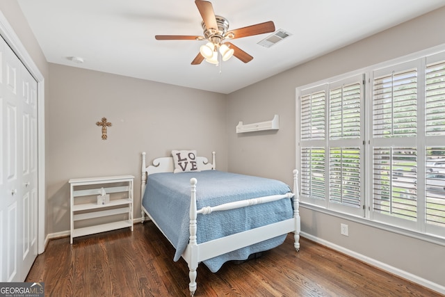 420 Windswept Ct, Roswell, GA 30075 - bedroom featuring a closet, baseboards, wood finished floors, and a ceiling fan