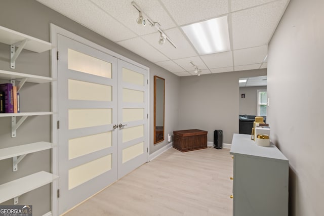 420 Windswept Ct, Roswell, GA 30075 - office space with light wood-style flooring, a drop ceiling, track lighting, and baseboards