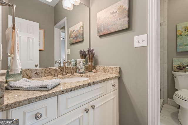420 Windswept Ct, Roswell, GA 30075 - full bathroom featuring toilet, vanity, and marble look tiles