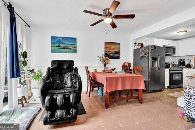 1150 Rankin St Unit 19O, Stone Mountain, GA 30083 - dining space with ceiling fan and light tile patterned floors