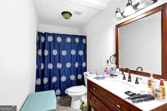 1150 Rankin St Unit 19O, Stone Mountain, GA 30083 - bathroom with vanity, toilet, and curtained shower