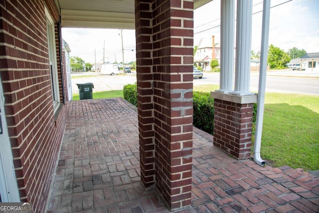 298 S Main St, Baxley, GA 31513 - view of patio featuring covered porch