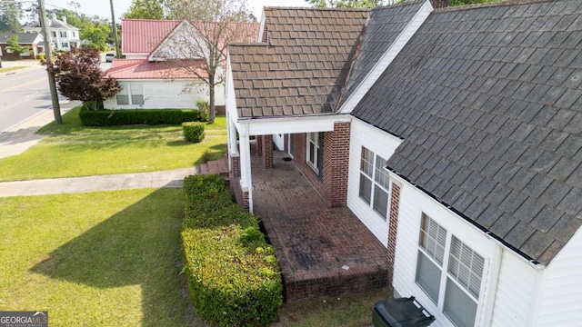 298 S Main St, Baxley, GA 31513 - view of side of property with a lawn
