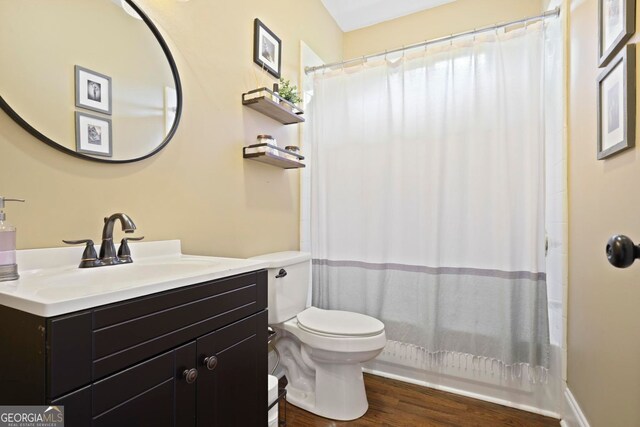 6317 Benbrooke Overlook NW, Acworth, GA 30101 - bathroom featuring vanity, wood finished floors, and shower / bath combination with curtain