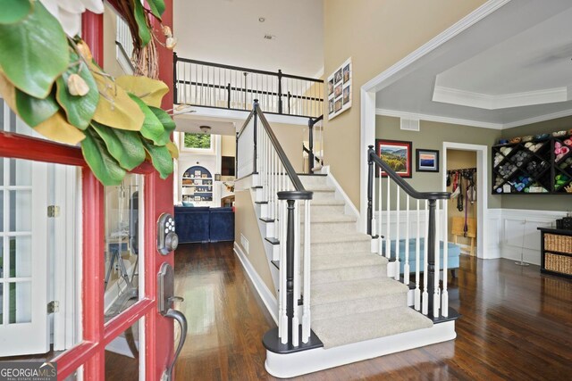 6317 Benbrooke Overlook NW, Acworth, GA 30101 - stairway with wood finished floors and crown molding