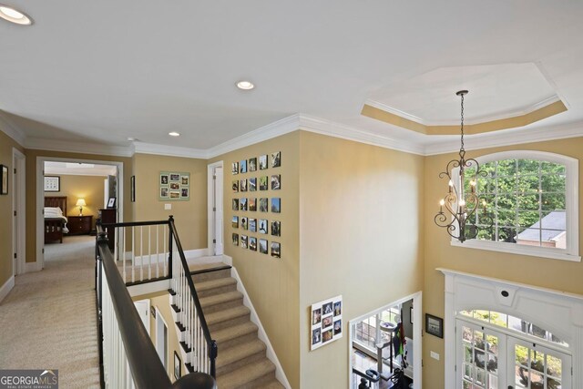 6317 Benbrooke Overlook NW, Acworth, GA 30101 - foyer with a chandelier, crown molding, light colored carpet, and recessed lighting