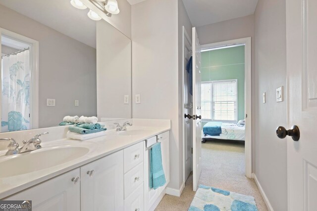 6317 Benbrooke Overlook NW, Acworth, GA 30101 - ensuite bathroom featuring double vanity and baseboards
