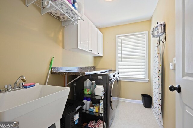 6317 Benbrooke Overlook NW, Acworth, GA 30101 - washroom featuring cabinet space, washing machine and dryer, and plenty of natural light