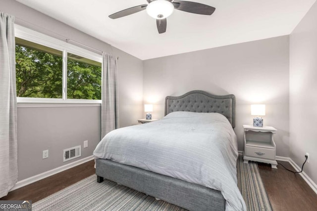 3890 Cherrydale Ln SE, Smyrna, GA 30082 - bedroom featuring wood finished floors, baseboards, and ceiling fan