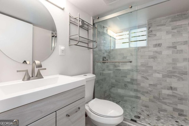 3890 Cherrydale Ln SE, Smyrna, GA 30082 - bathroom featuring toilet, a stall shower, and vanity