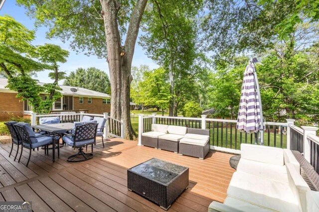 3890 Cherrydale Ln SE, Smyrna, GA 30082 - wooden terrace with outdoor lounge area and outdoor dining area