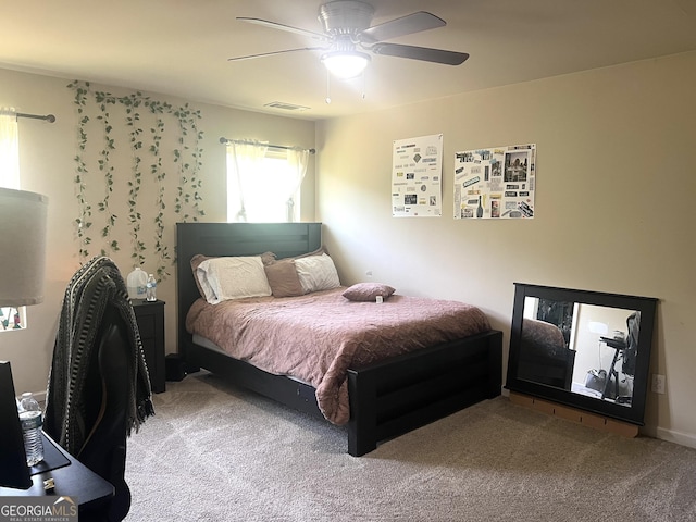 bedroom with carpet flooring and a ceiling fan